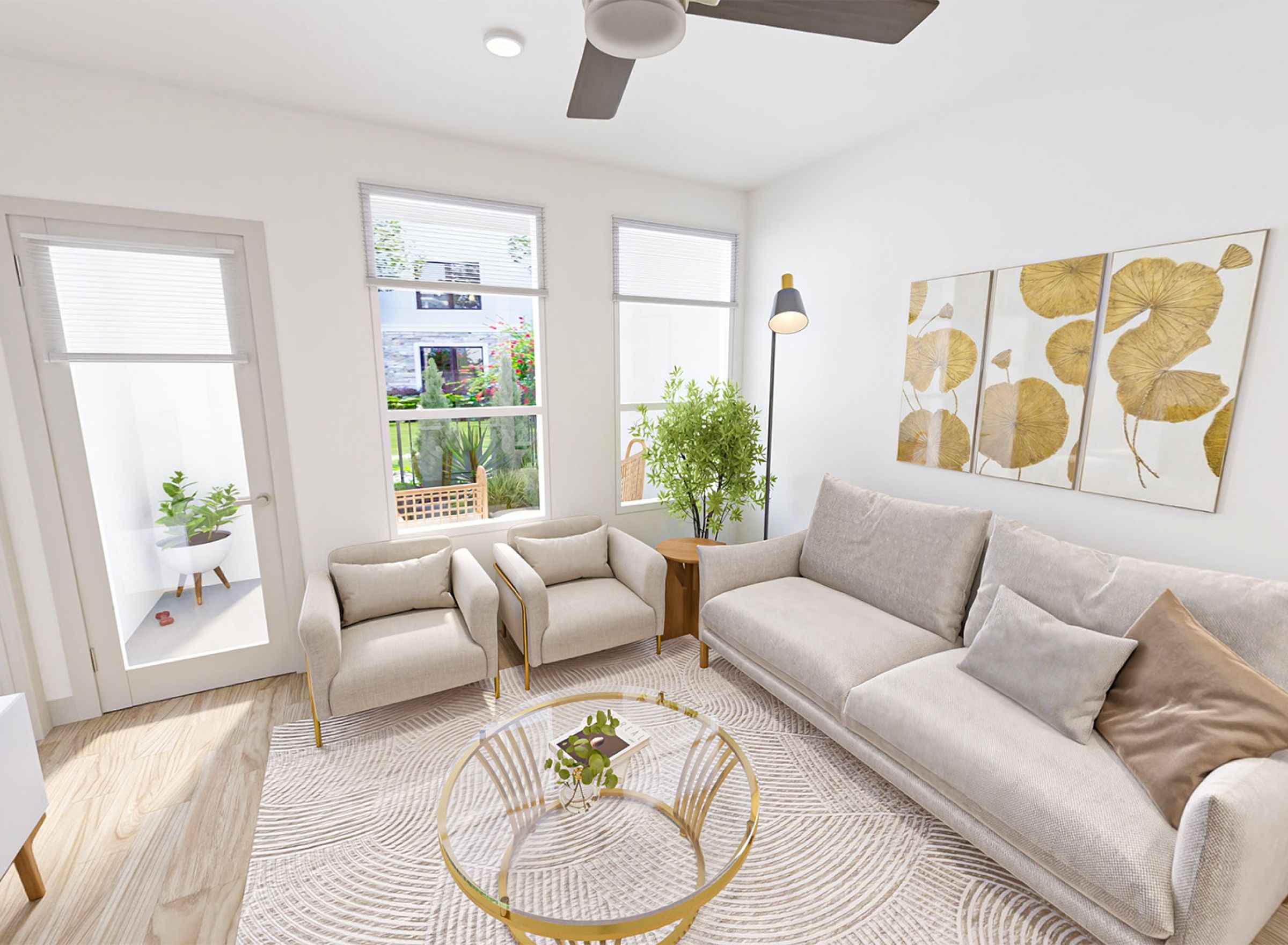 Monteverde Apartments Bright living room with beige sofa, two chairs, wall art, and large windows letting in natural light.