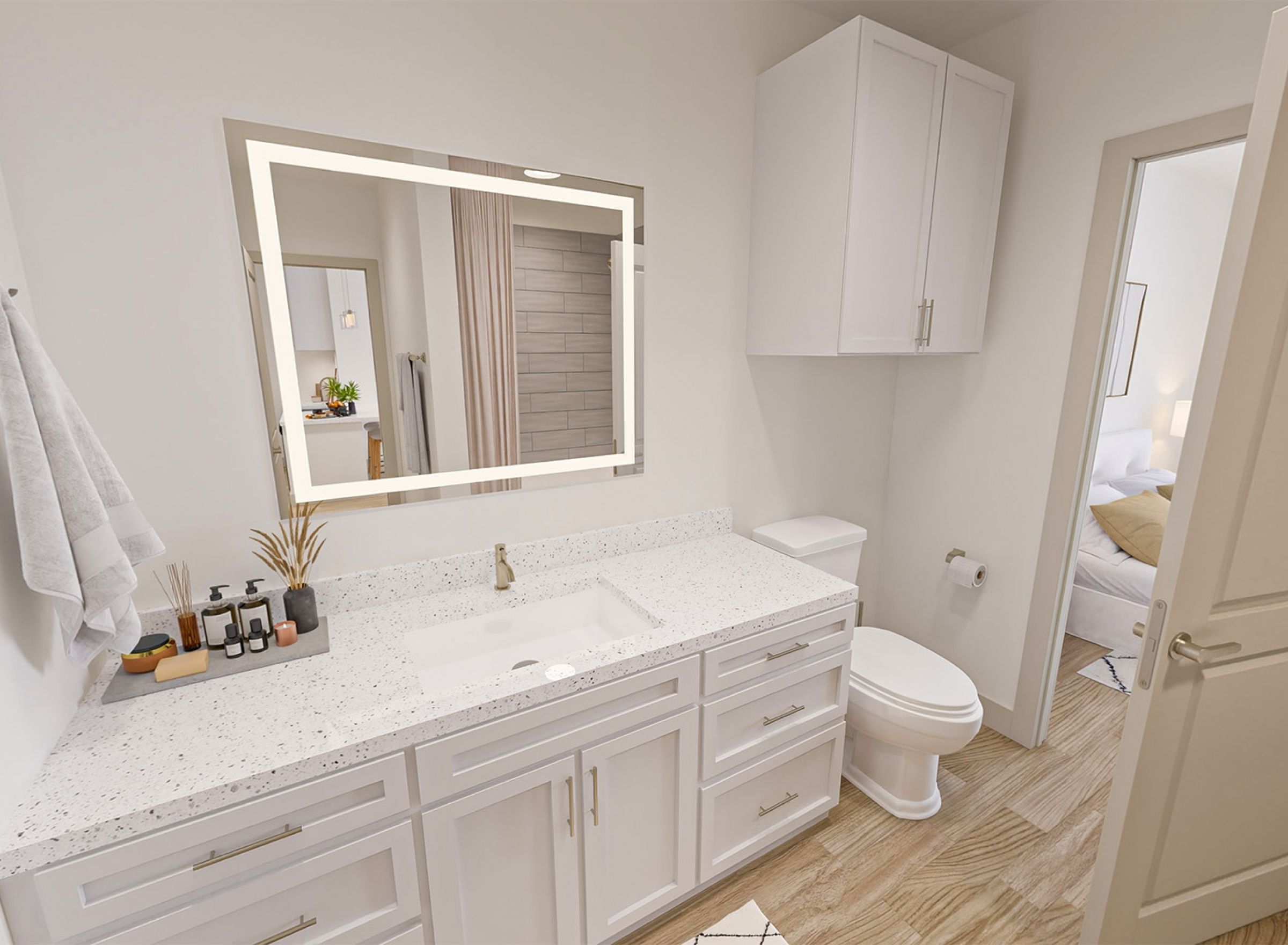 Monteverde Apartments Modern bathroom with white cabinets, a large mirror, and door open to a bedroom in the background.