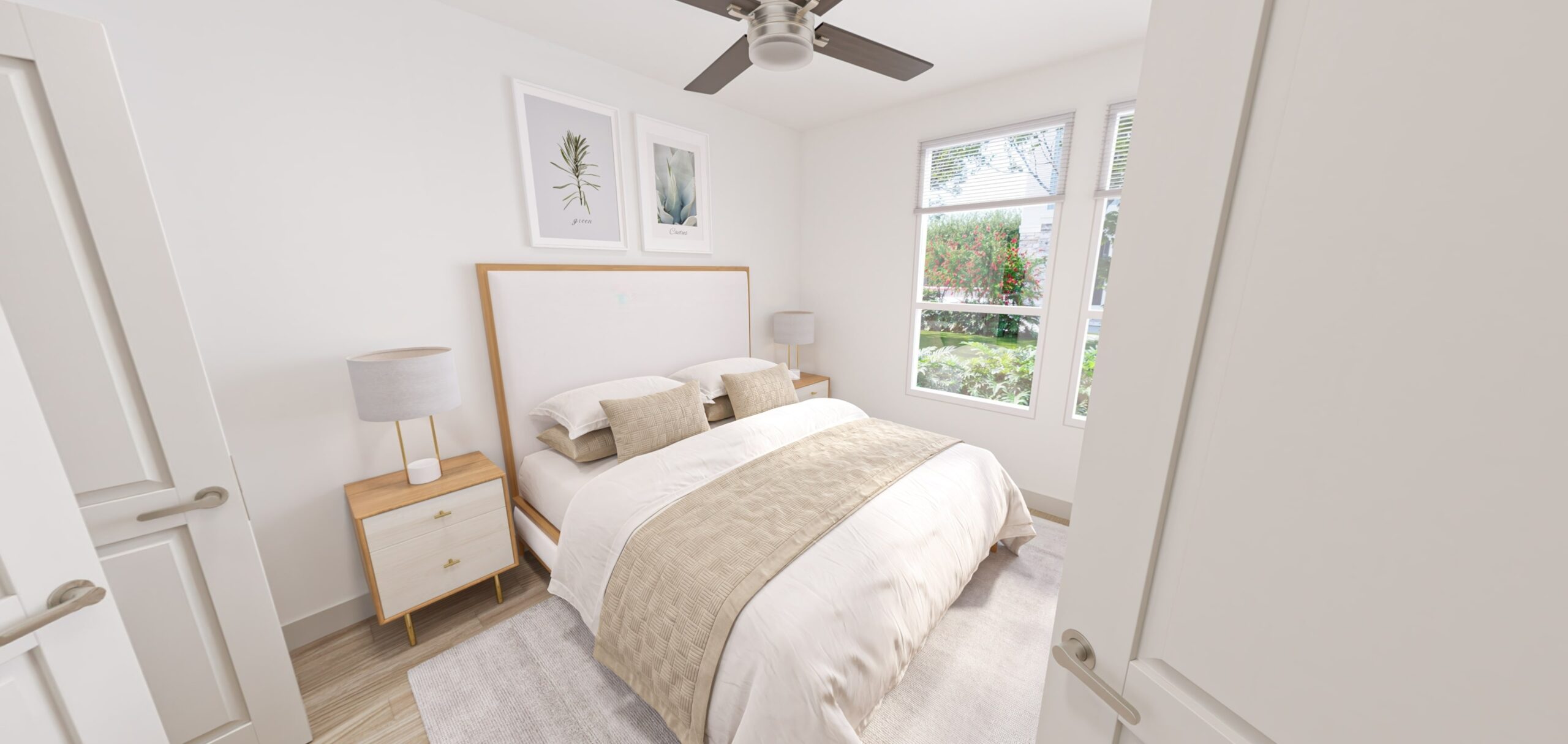 Monteverde Apartments Bright bedroom in Monteverde with a bed, nightstands, lamps, and large windows—modern living in San Antonio apartments.